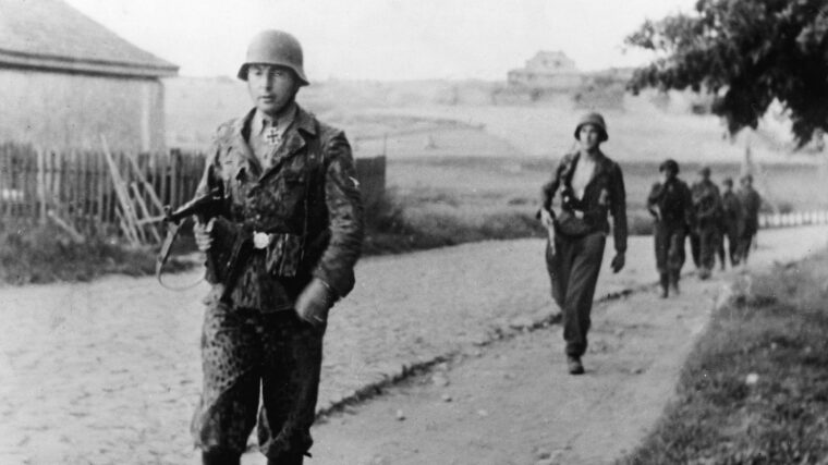 Marching along on the Eastern Front at the head of his men, SS officer Leon Degrelle was a foreign-born politician who became a decorated military leader and saw extensive combat with German forces in World War II.