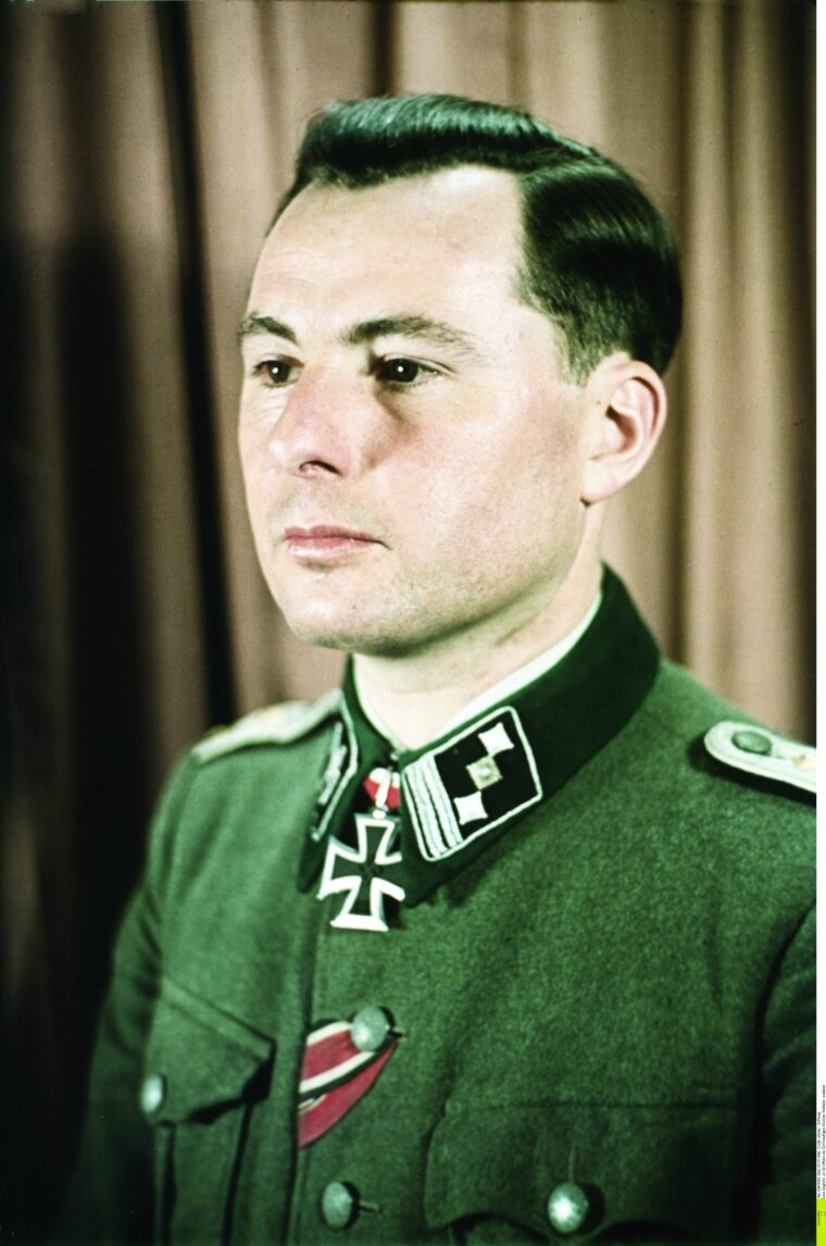 SS Hauptsturmführer Leon Degrelle poses for an official portrait. The Knight’s Cross is clearly visible at his throat.