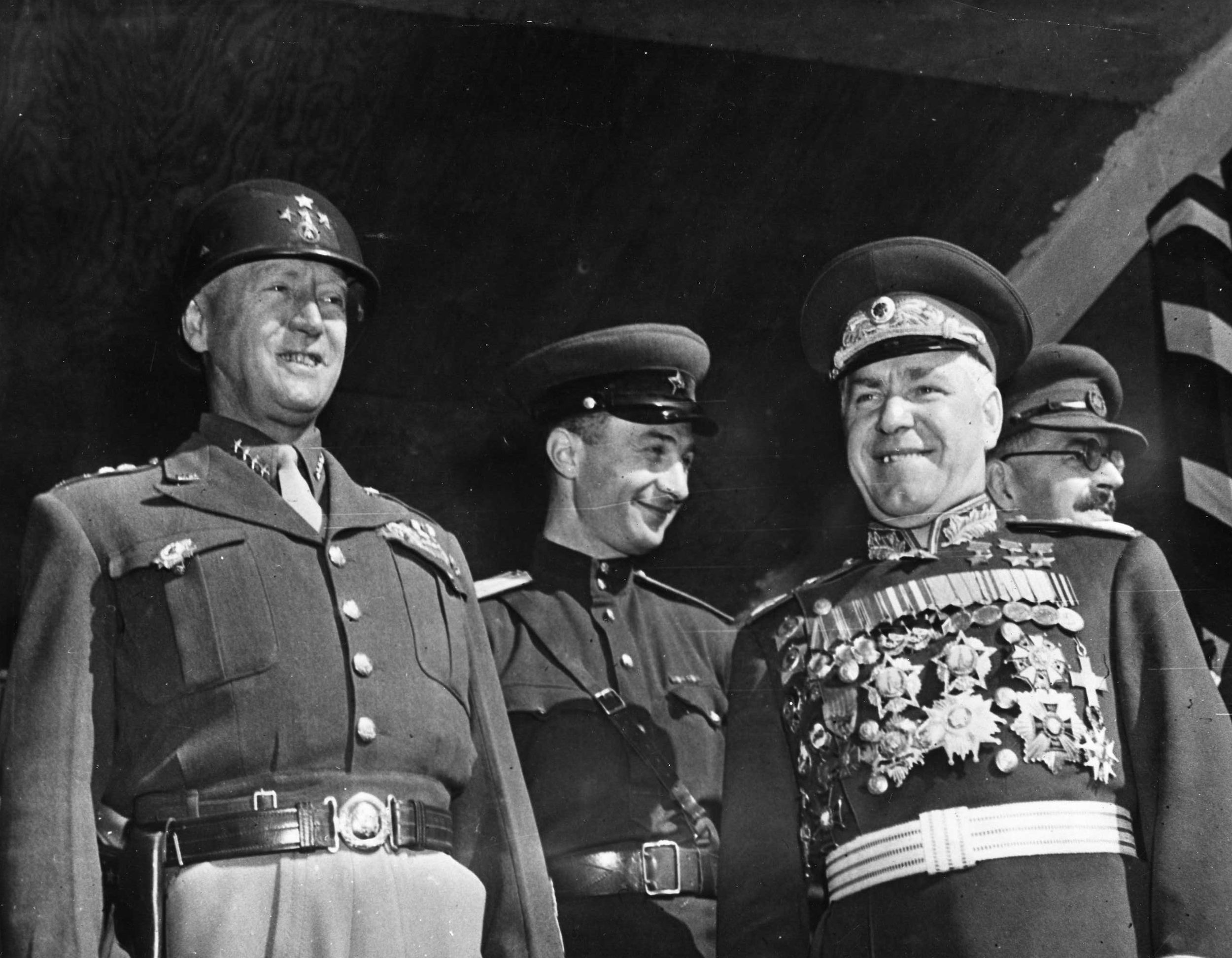 General George S. Patton, Jr., (left) strains to smile in company with Marshal Georgi Zhukov during a September 7, 1945, parade in Berlin. The two were present during activities celebrating the Allied victory over Japan.