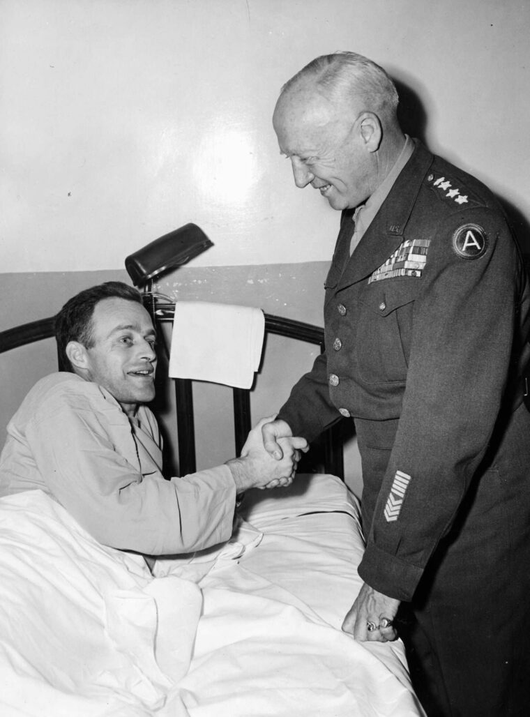 General Patton visits his son-in-law, Lieutenant Colonel John Waters, while the latter recuperates in Walter Reed U.S. Army Hospital in Washington, D.C. Waters had been held in a German prison camp for three years. Patton was reported to have attempted a rescue operation at one time.