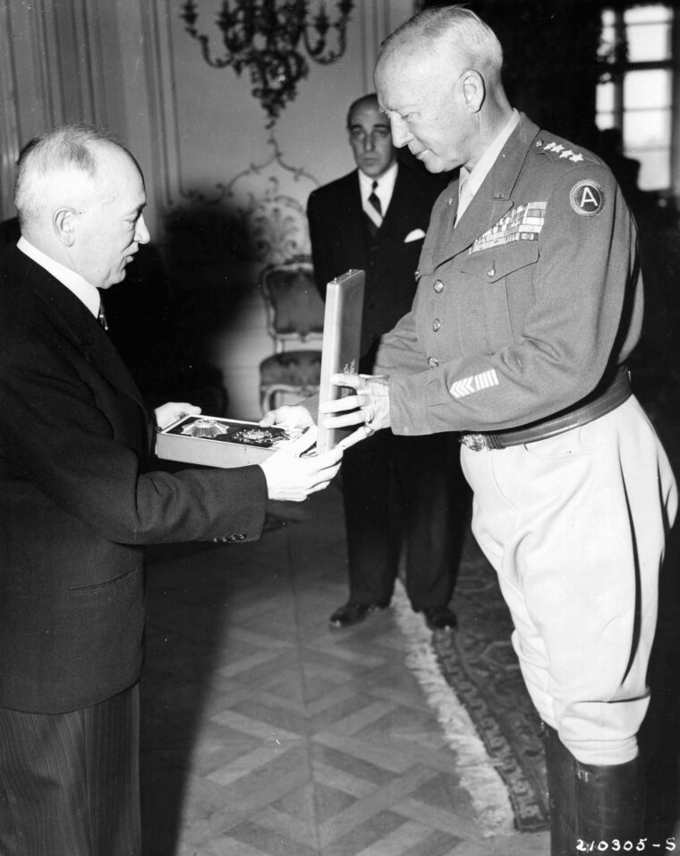 General Patton receives the Order of the White Lion and the Military Cross, first class, from President Eduard Benes of Czechoslovakia, July 27, 1945.
