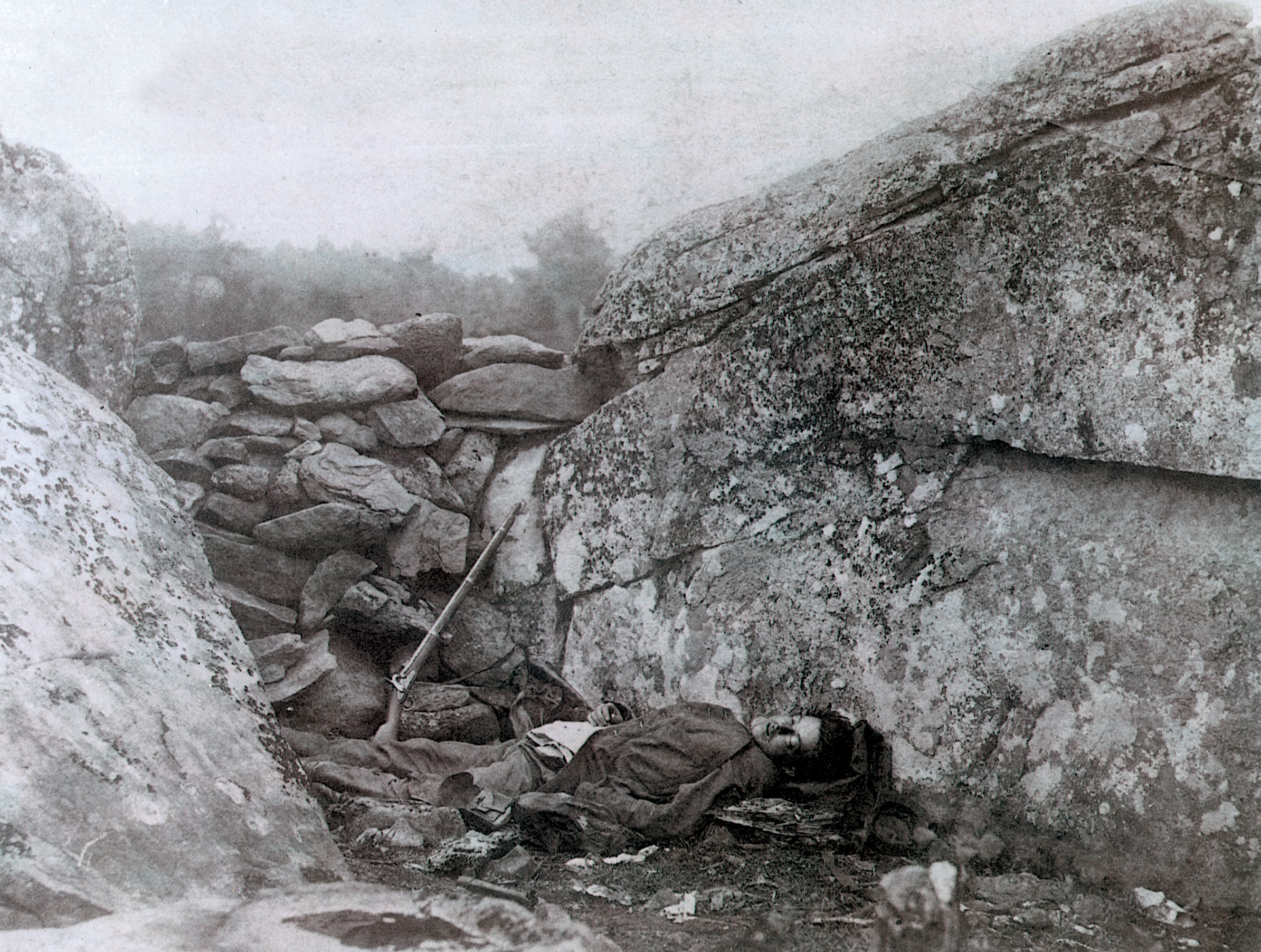 A dead Confederate soldier lies in a sharpshooter’s nest in Devil’s Den. This photo was posed—probably by photographer Timothy O’Sullivan.