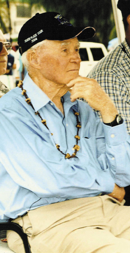 An aged Tibbets takes in the sights at EAA AirVenture in 2004. 