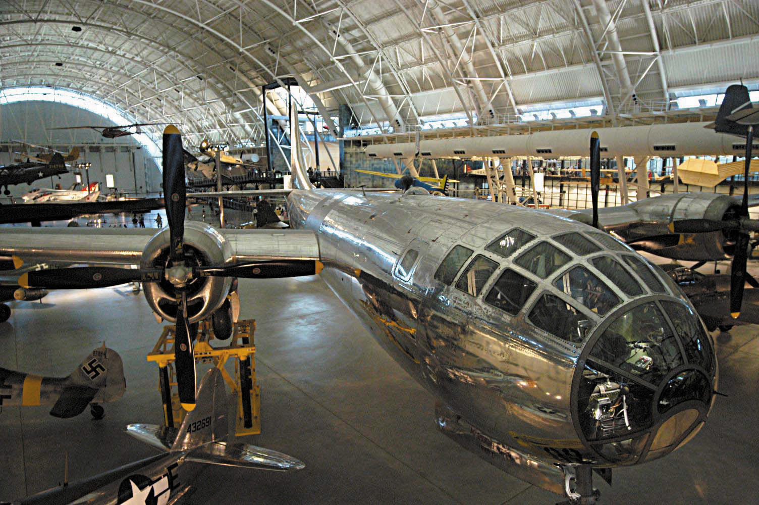 The gleaming Boeing B-29 bomber Enola Gay occupies a prominent space in the hangar at the Smithsonian Air & Space Museum in Chantilly, Va.