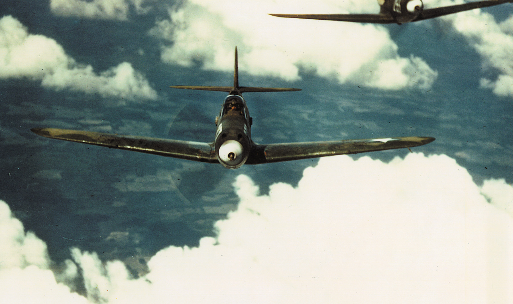 A pair of Bell P-39s wing their way to Africa during Operation Torch.