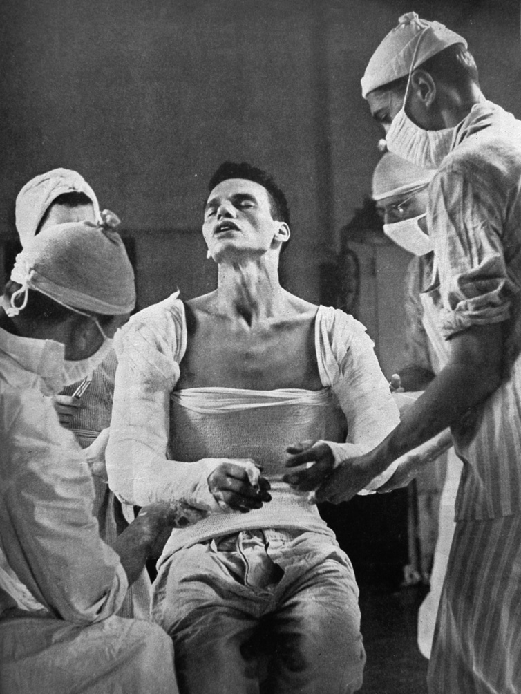 Morse caught Lott grimacing in pain as Army surgeons applied plaster casts to his injured body and arms back in the States.
