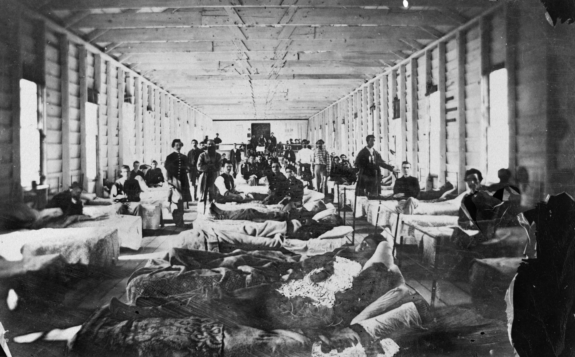 Wounded Union soldiers convalesce near Alexandria, Virginia, in July 1864. The grinding Wilderness campaign that spring and summer filled the hospitals to bursting.