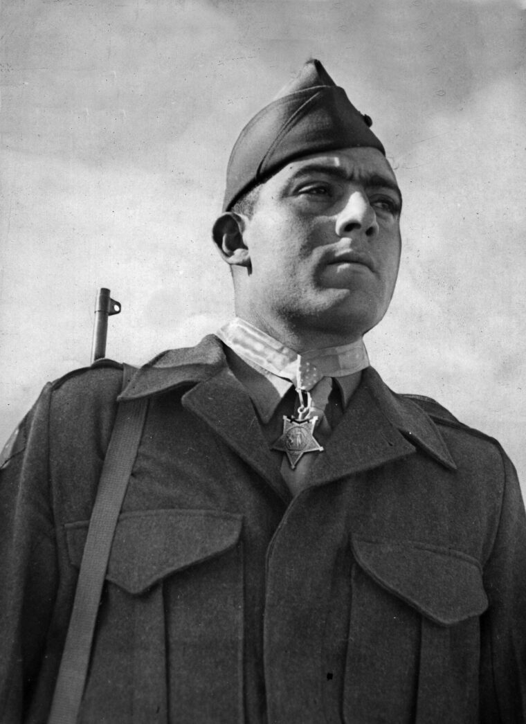 Marine Sergeant John Basilone receives his Medal of Honor in recognition of his heroism on Guadalcanal on October 24-25, 1942. 