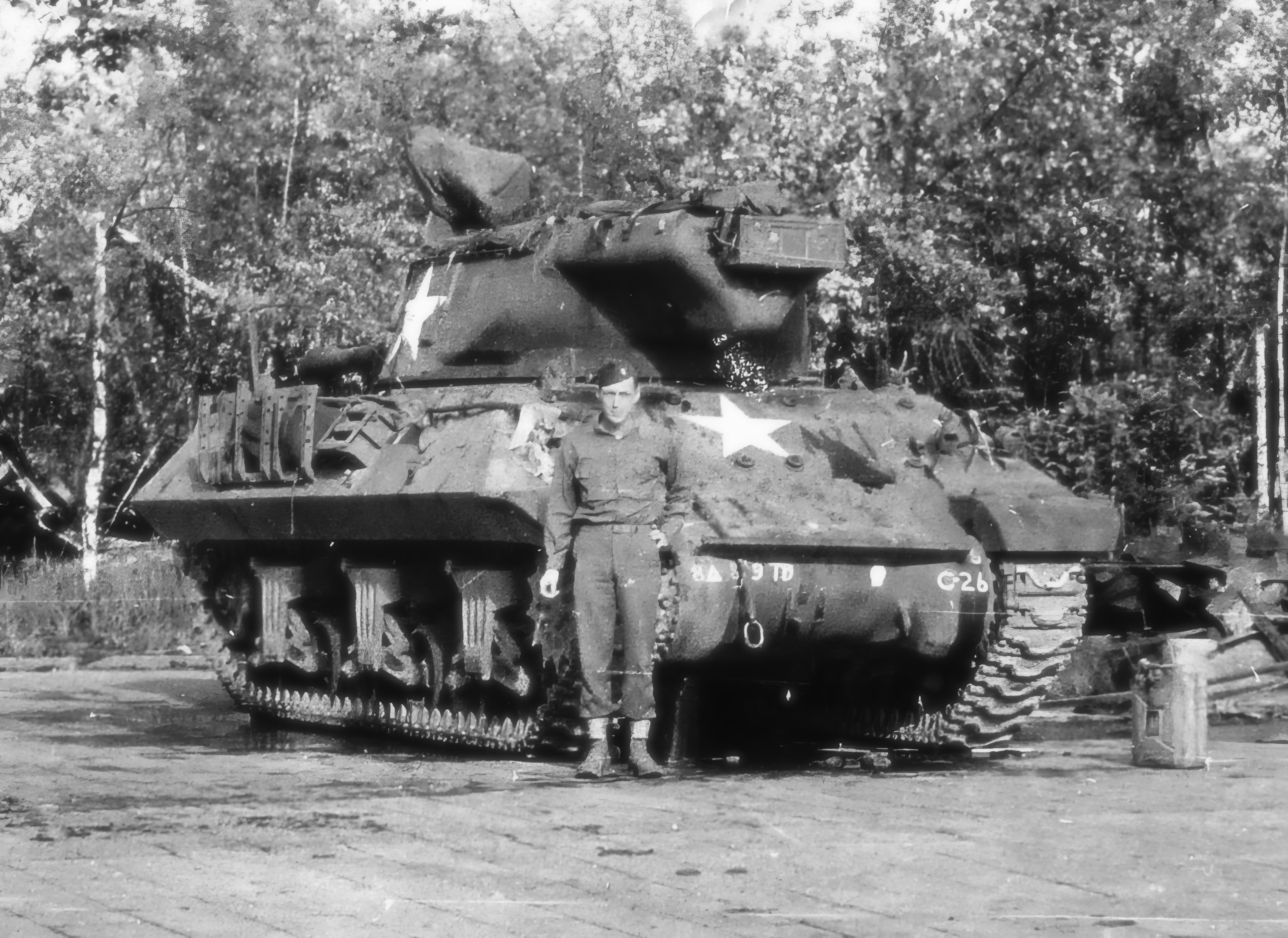 An unidentified 809th TD Battalion officer poses in front of an M36 Jackson tank destroyer. The battalion operated with M18 Hellcat tank destroyers from the beginning of their deployment until April 11, 1945 (Baker Company) and April 13, 1945 (Able and Charlie Companies), when they were replaced with M36 tank destroyers in Soest, Germany.