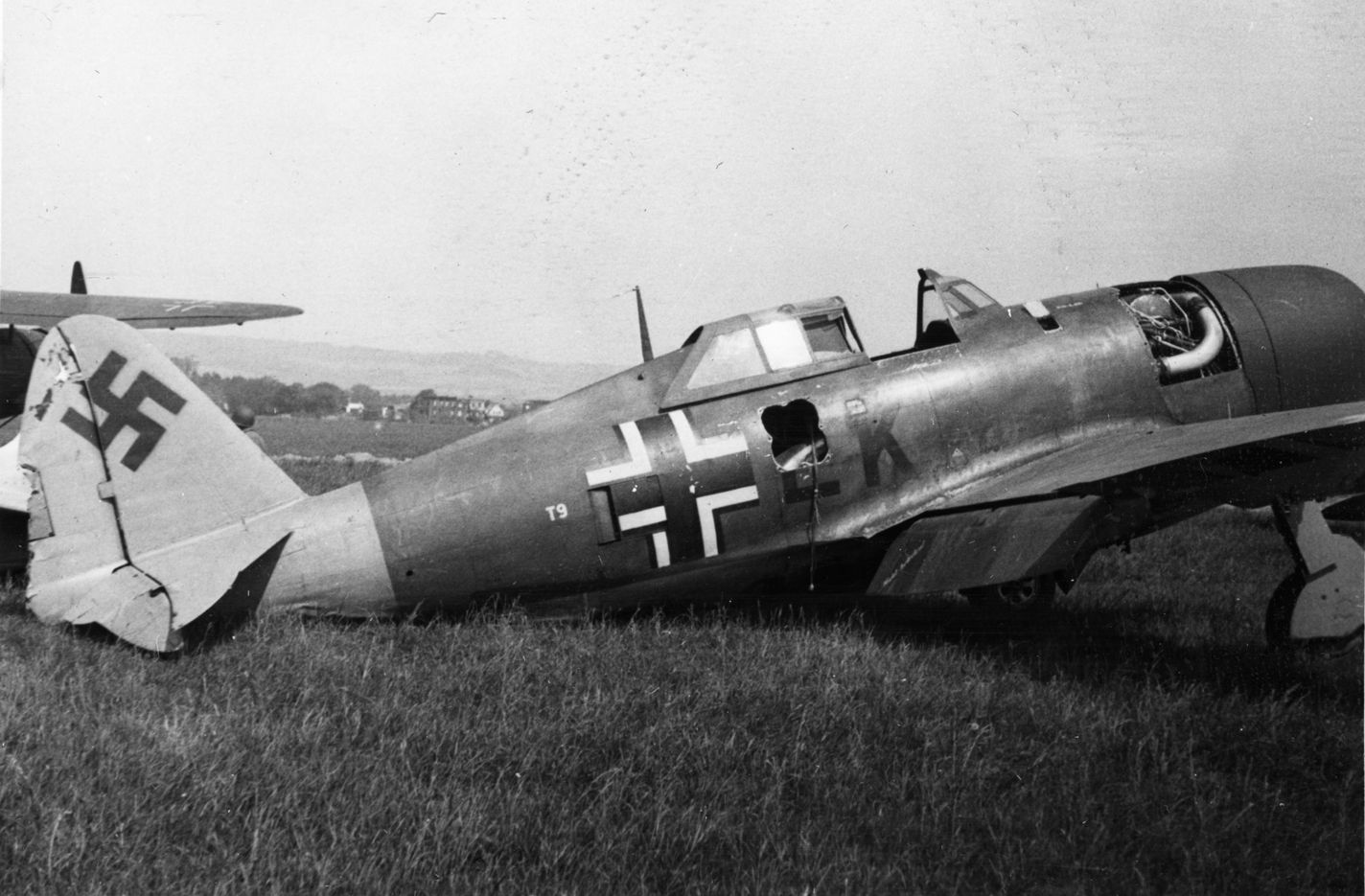 This photo, taken May 15, 1945, shows a captured Republic P-47 Thunderbolt fighter aircraft in German markings at Göttingen airfield in central Germany. Göttingen was a base for the Zirkus Rosarius, formed by Hauptmann Theodor Rosarius in 1943, a special test unit of the Luftwaffe high command. The unit tested captured British and American aircraft (called Beuteflugzeug) that were repainted with German insignia. The purpose was to discover the enemy aircraft design strengths, vulnerabilities, and performance, and to use the information to enable German pilots to develop countertactics.
