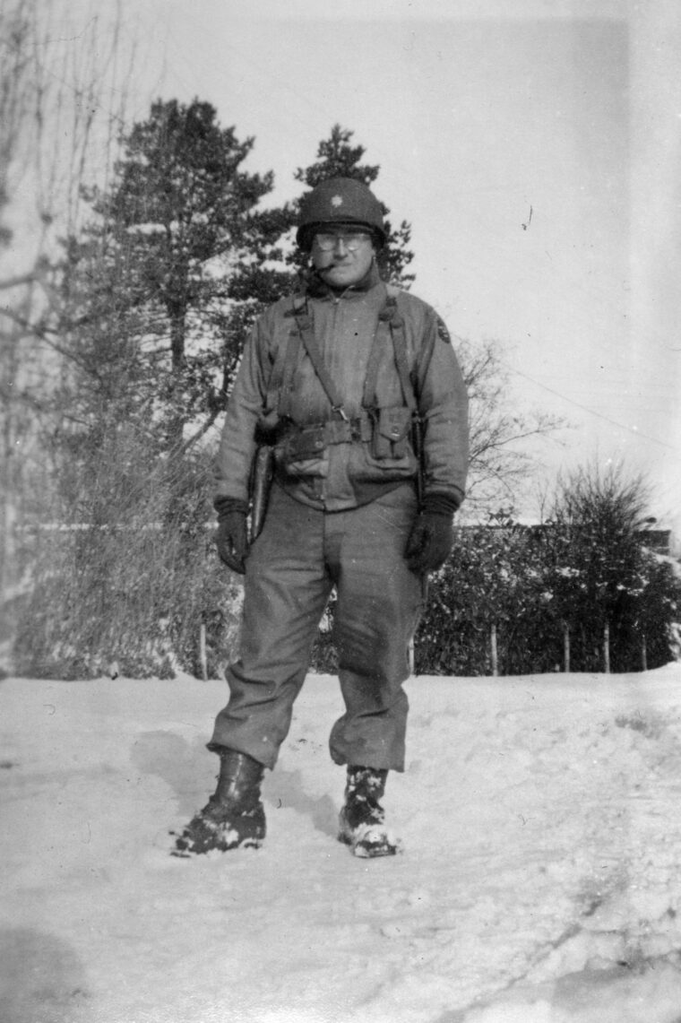 My father, Major Louis R. Fausset, photographed on February 3, 1945 (his 26th birthday), near Maucomble, France. The battalion was en route to the front lines in Holland and bivouacked for 10 days in Maucomble (approximately 75 miles northeast of Le Havre, in upper Normandy). The battalion’s first combat action would occur on February 20 near the town of Berkelaar, Holland. 