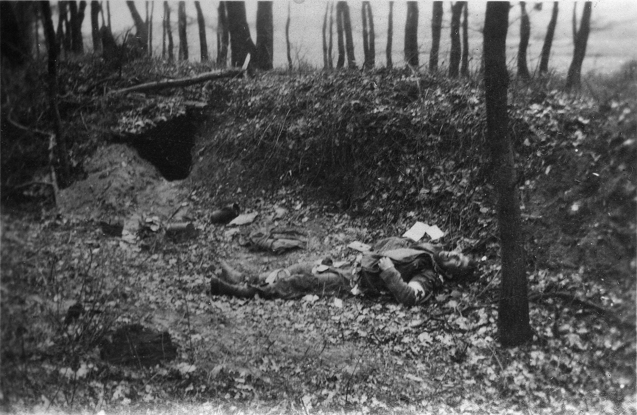  A German medic lies dead near Linne, Holland, February 27, 1945. The 809th was supporting the 314th Infantry Regiment, 79th Infantry Division, attacking through Linne toward the Roer River, and stood ready to repel any German armored counterattacks. The battalion crossed the Roer River on February 28, 1945.