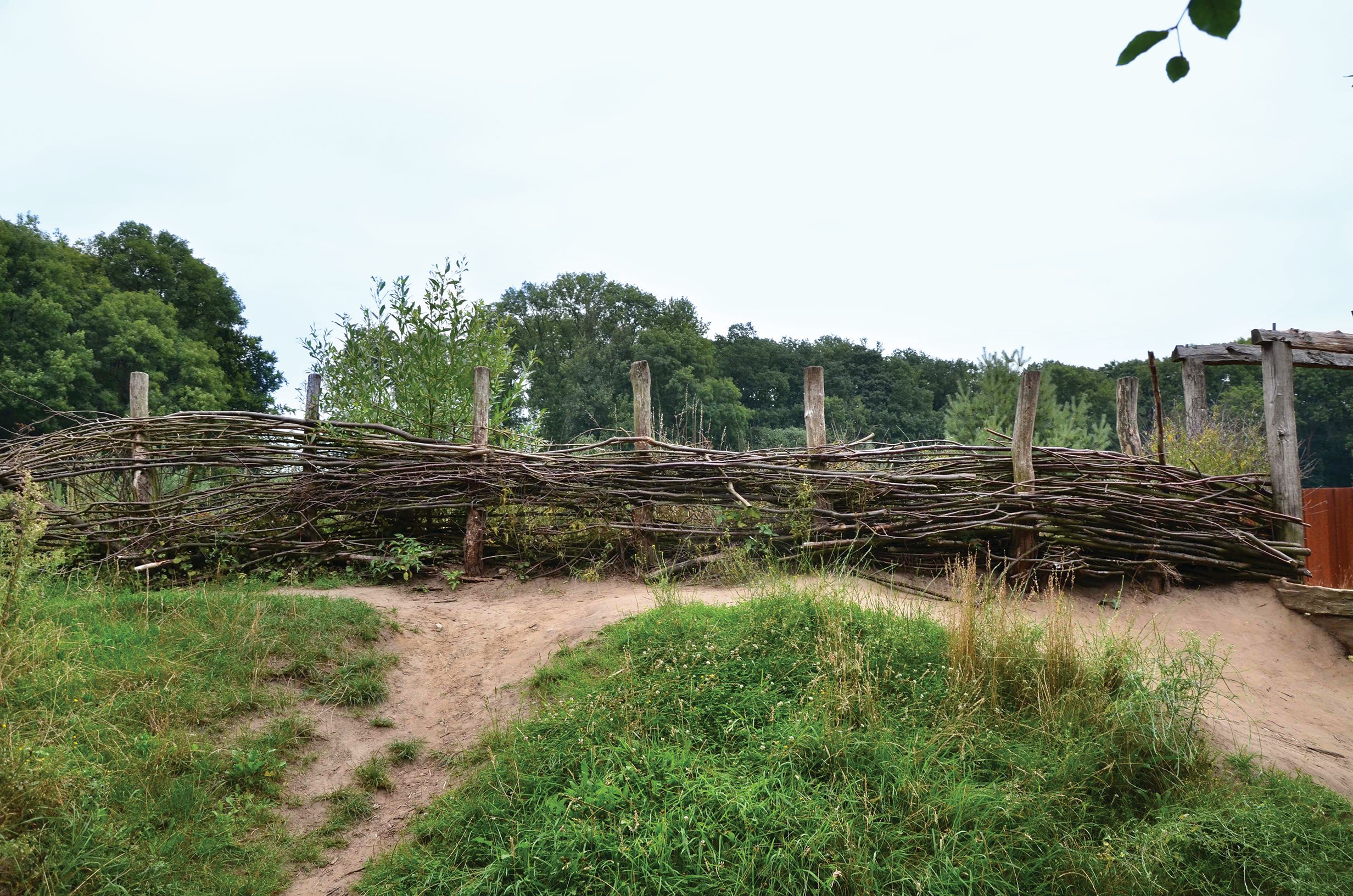 A reconstructed earth and brush rampart at the Kalkriese Museum and Park in northwest Germany, believed to be the site of the Battle of Teutoburg Forest. The rampart was built after the discovery of what has been identified as either part of the Roman fortified camp built during the battle, or a German fortification built to trap the Romans on the lower trail.