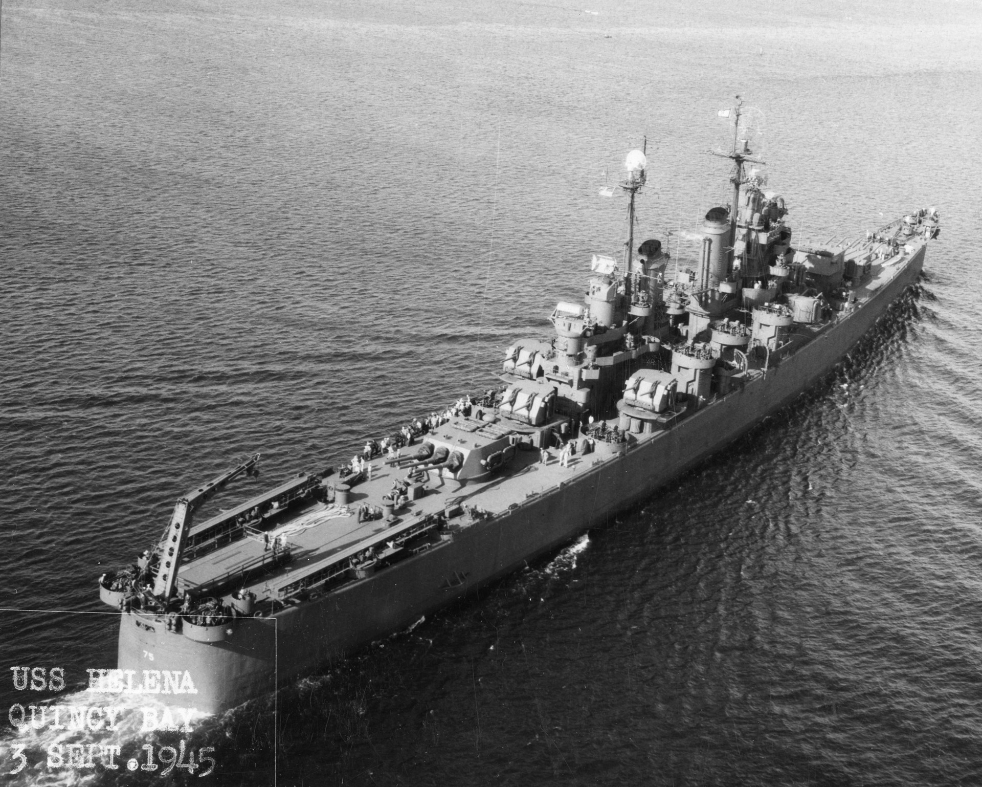 The St. Louis-class light cruiser USS Helena (CL-50), one of four cruisers taking part in the Munda operation, displays her impressive armament. Her AA guns may have brought down a Japanese plane during the Munda assault.