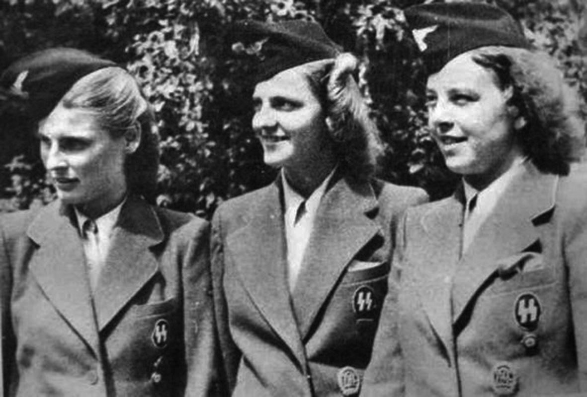 Grese (center, with two other Aufseherin at an unidentified location in 1941) always did everything to appear well-dressed and perfectly coiffed.