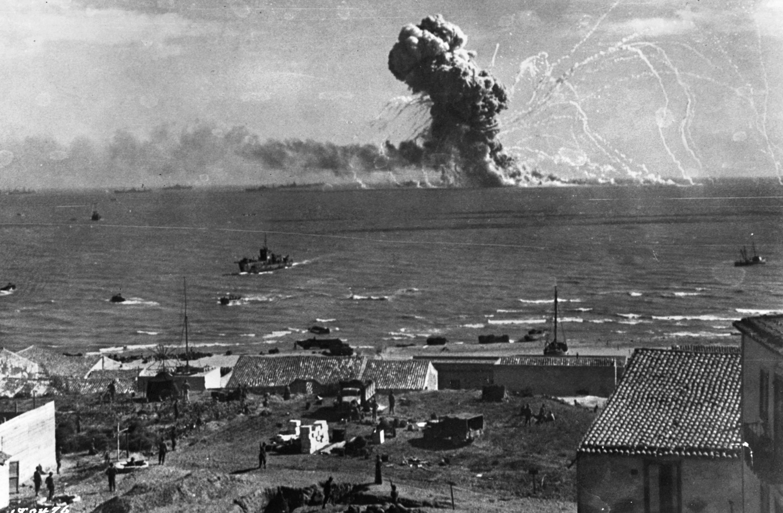 The ammunition ship SS Robert Rowan erupts in a spectacular explosion after being hit by a bomb from Luftwaffe Ju-88 bombers during the American landing operations off the coast of Gela, Sicily. The Germans were largely unopposed in the air during the landings.
