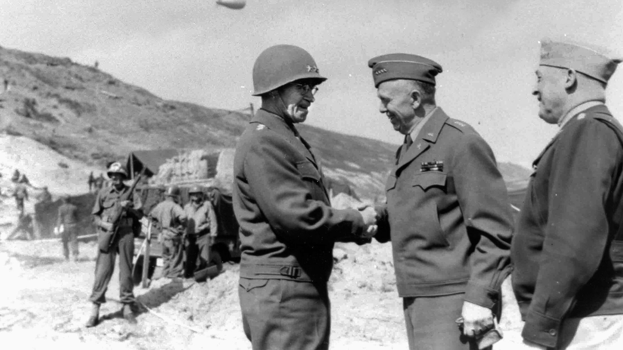 Lieutenant General Omar Bradley greets Marshall in Normandy in June 1944.