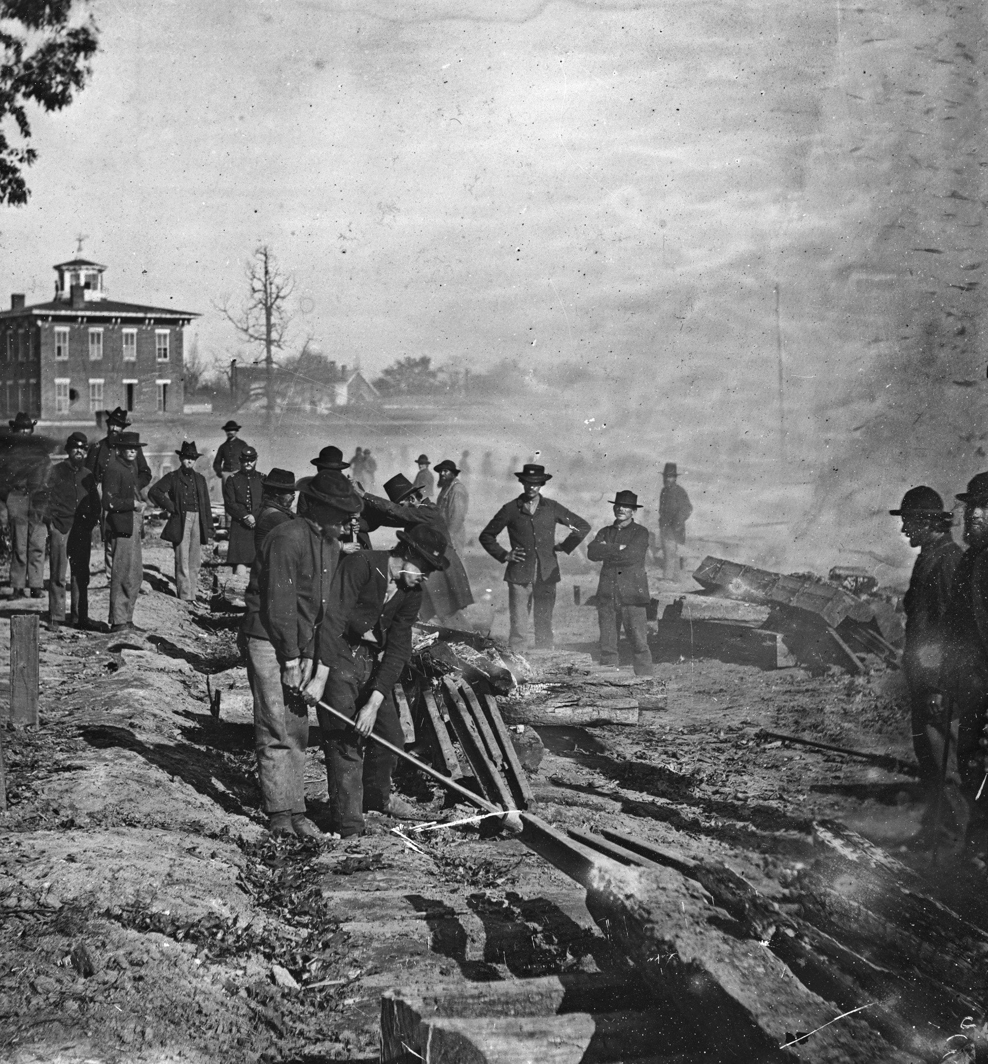 Maj. Gen. William Tecumseh Sherman’s notorious “bummers” destroy a section of railroad at Atlanta, Georgia, in the summer of 1864. Photographer George N. Barnard was one of the few to record the Civil War in the Western theater.