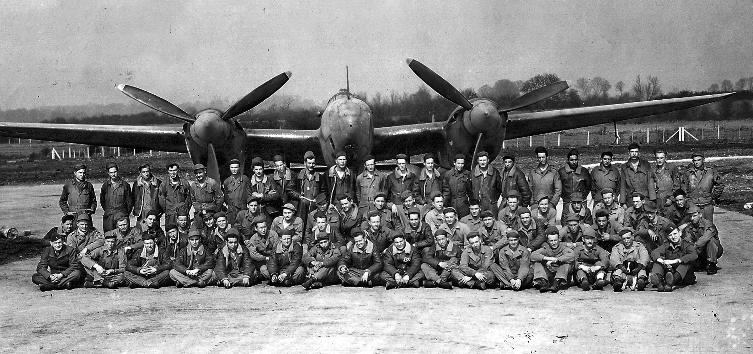 The aircraft mechanics and technicians of the 30th Squadron, 67th Tactical Reconnaissance Group, Ninth Air Force, photographed at their English base in Chalgrove, Oxfordshire, April 8, 1944. 