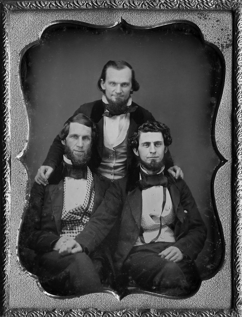 Photographer Cook, center, poses with unidentified friends in 1862. 