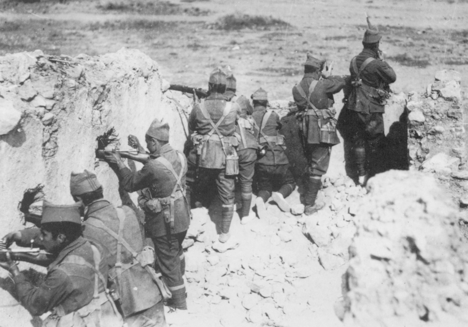 Legionaries stand in a destroyed building ready to repulse an attack. Their creed was to rush to the sound of gunfire and to never complain of any hardship. 