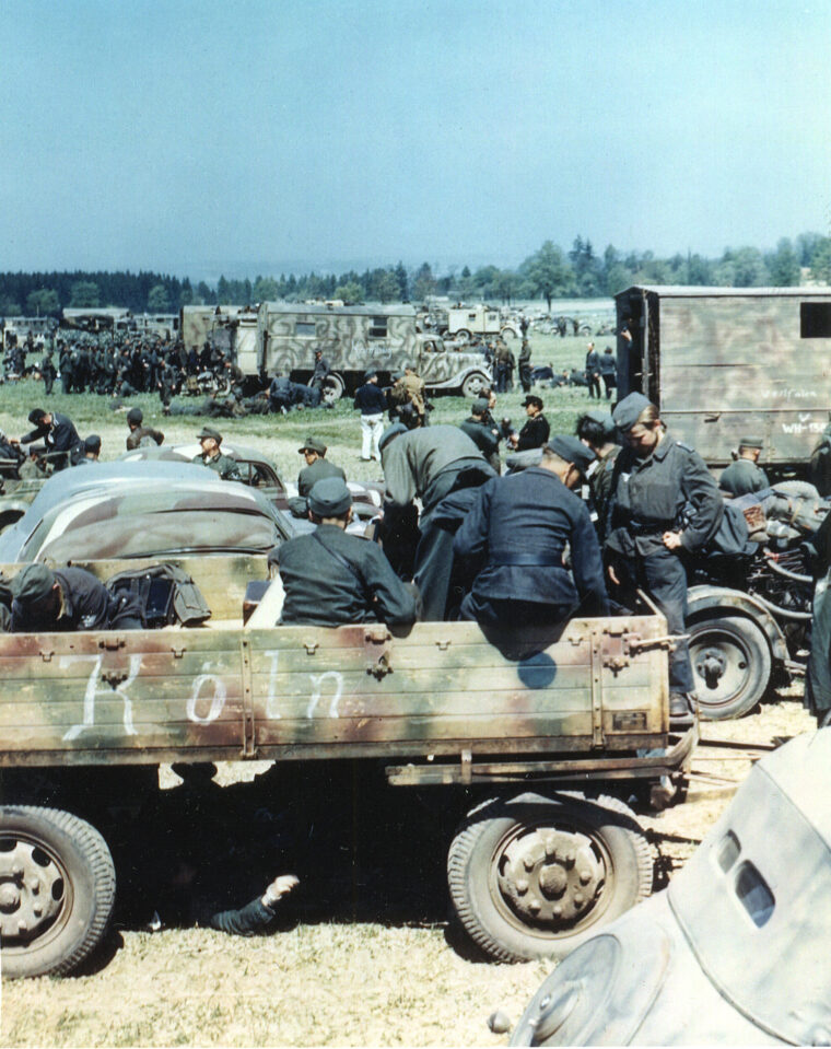 German POWs mill about awaiting transport after surrendering to the U.S. 1st Infantry Division in Czechoslovakia.