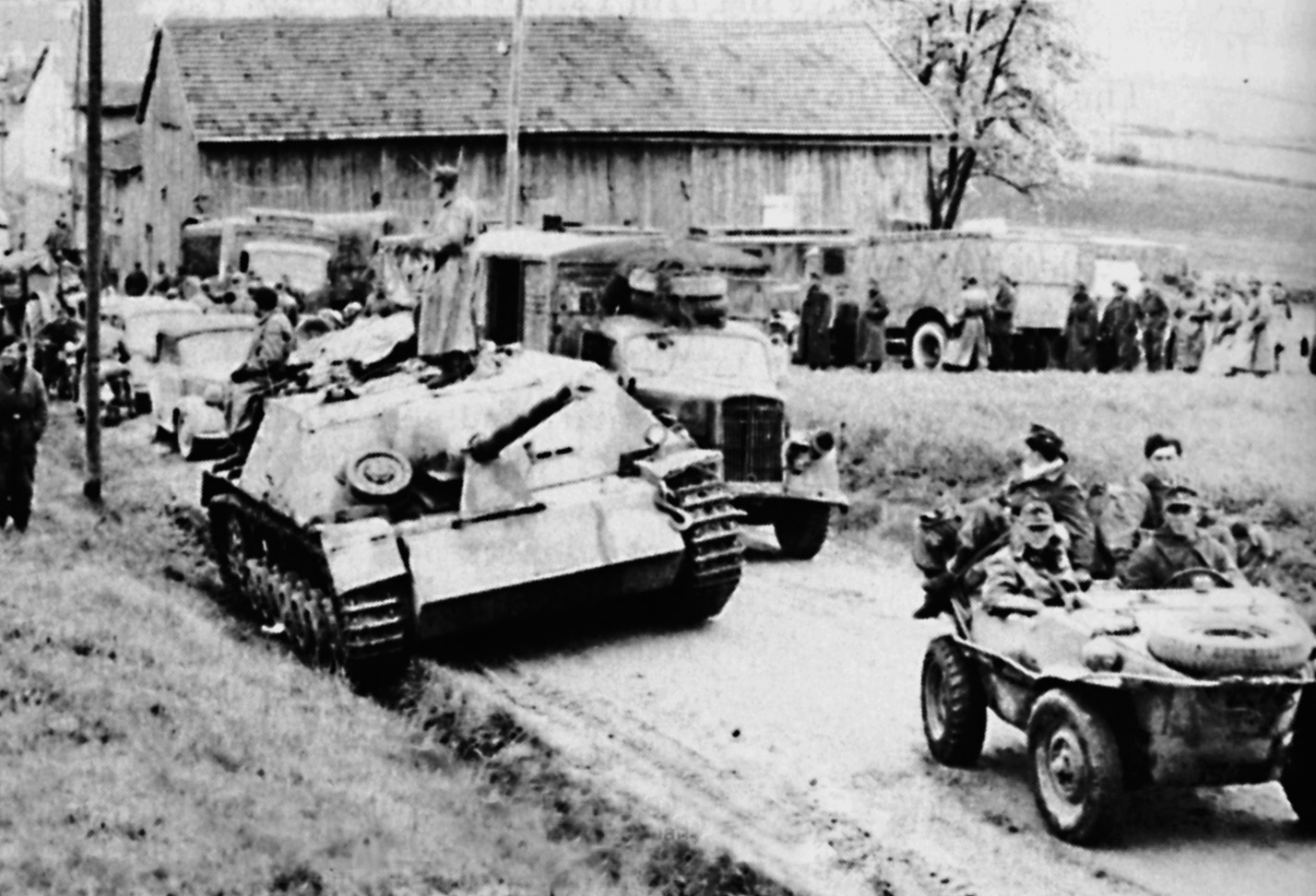 Members of the 11th Panzer abandon tanks and other motorized vehicles at one of the two designated assembly areas.