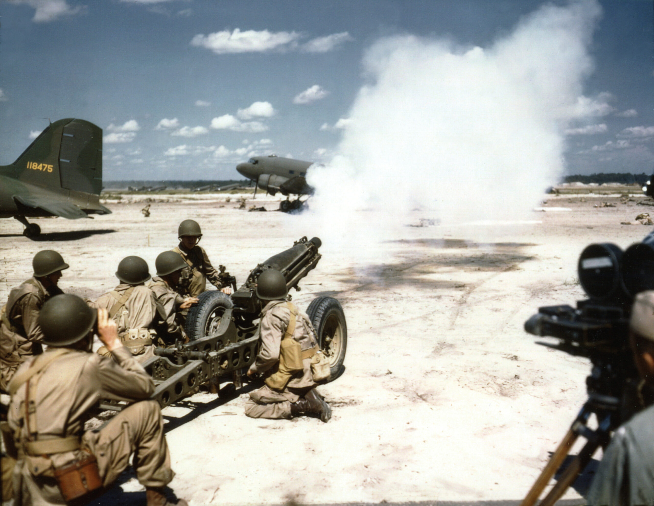 Boom! Airborne artillerymen fire off a round from their 105mm howitzer during a battle simulation.