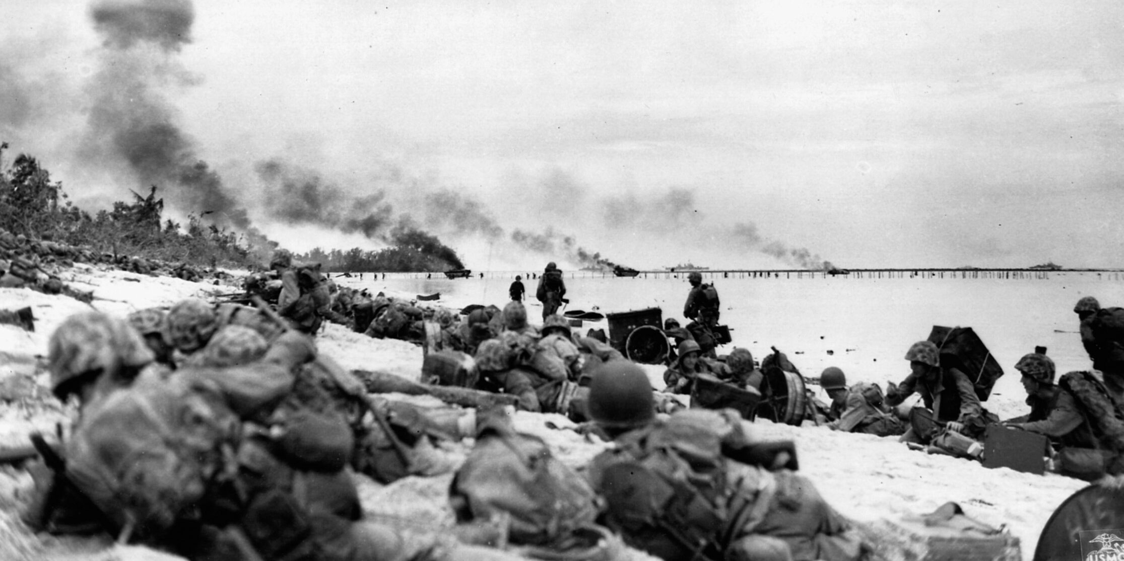 Marines land on “Orange One” beach at Peleliu. Minutes later, the relative calm would be broken and the Marines would meet fanatical Japanese resistance.
