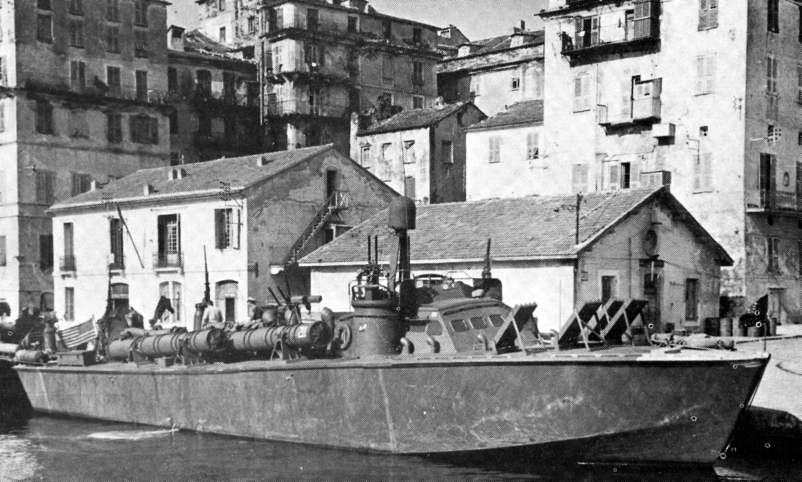 PT 211, one of the PT boats that saw action in Operation Ginny, lies docked at the port of Bastia in February 1944.