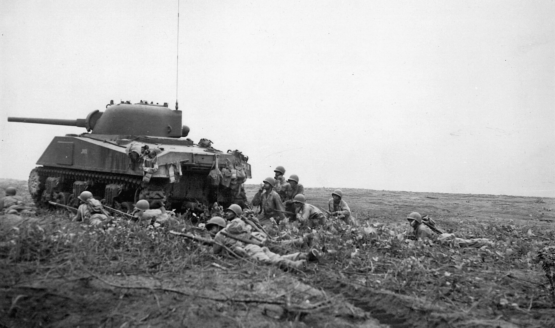 Troops of the 24th Infantry, attached to the 23rd (Americal) Division, gather behind a Sherman tank before assaulting enemy positions near Empress Augusta Bay, Bougainville, 1944. By war’s end, the 93rd reached Mindanao and Leyte in the Philippines and proved that black soldiers were every bit as brave as their white counterparts.
