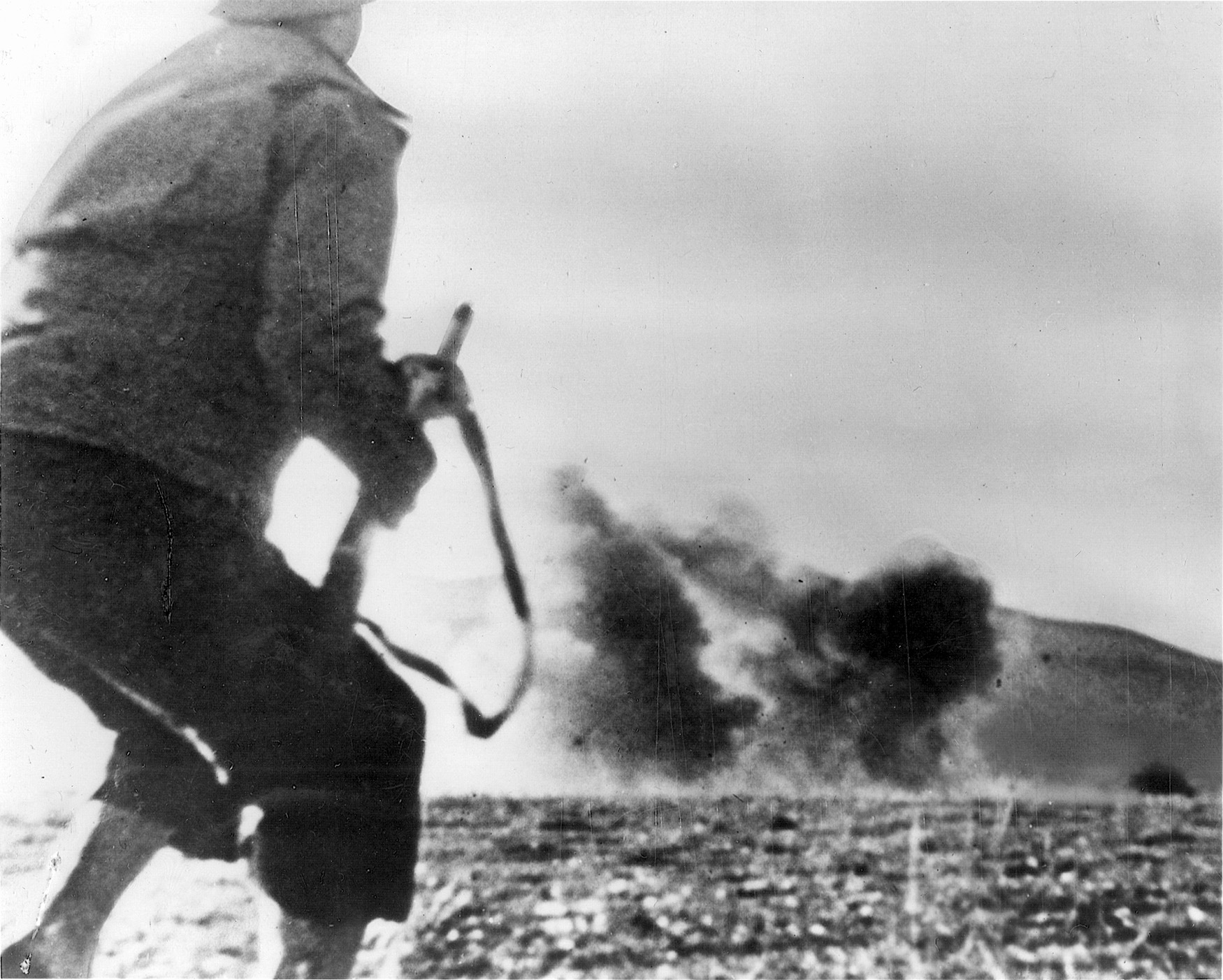 A German artillery shell shocks an American soldier on the battlefield in North Africa. Early encounters with the Germans resulted in stinging defeats for the U.S. Army. 