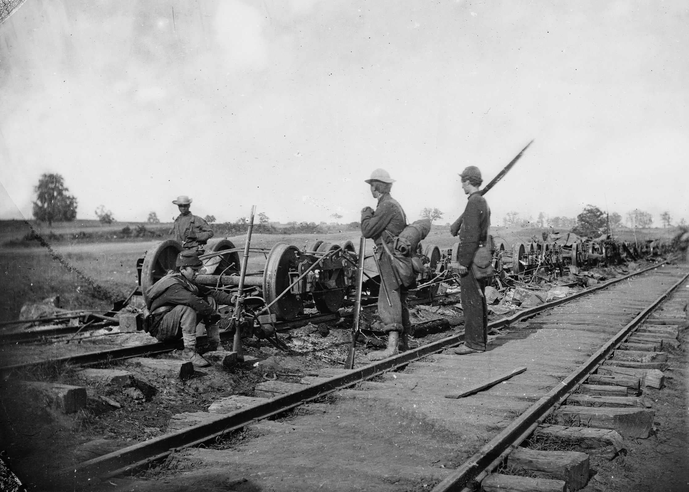 Union soldiers survey the damaged rolling stock of the Orange & Alexandria Railroad at Manassas Junction shortly before the Battle of Brawner’s Farm. The
junction was fought over frequently during the war.