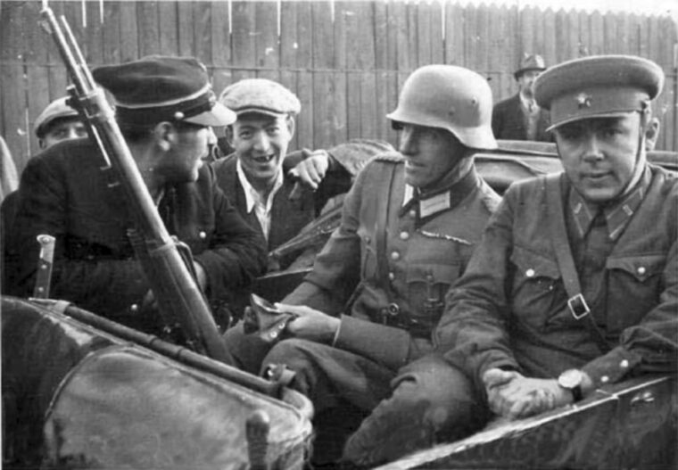 The fact that Nazi Germany and Soviet Russia had conspired to invade and partition Poland in 1939 was conveniently ignored during discussions of the future of Poland following the coming Allied victory in World War II at the Tehran Conference in 1943. In this photo, German and Soviet soldiers share a ride during operations in 1939.