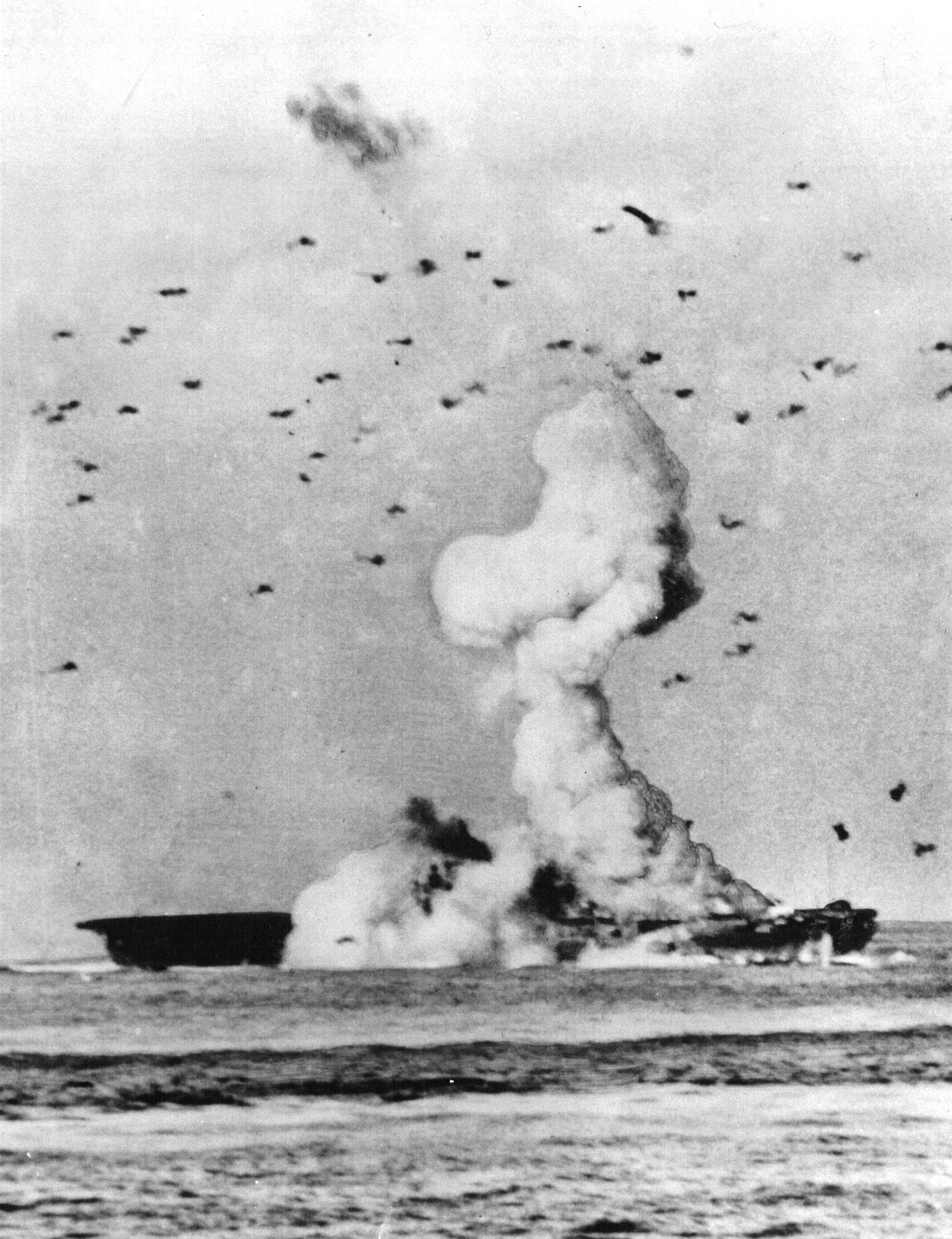 Navy photographer William Barr snapped this dramatic moment as a kamikaze exploded on the flight deck of the USS Enterprise, May 14, 1945. 