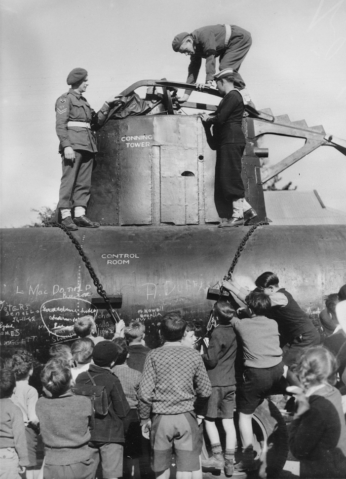 Two of the Japanese submarines that attacked Sydney Harbor were recovered and their crews buried with military honors. A complete submarine was put together using parts of the two recovered craft put on display at Bennelong Point, now the site of the famed Sydney Opera House. 