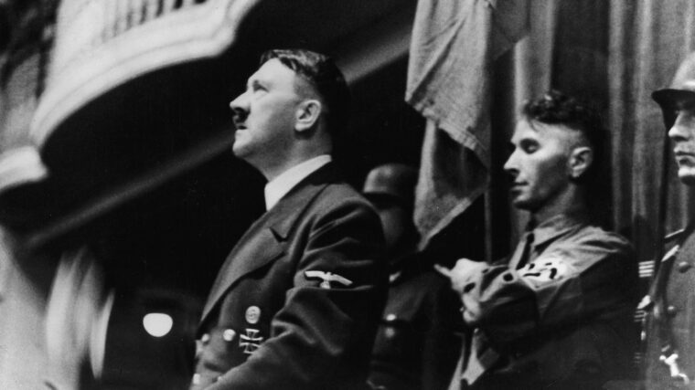 Hitler speaks at the Burgerbraukeller three months before the nearly successful attempt on his life.