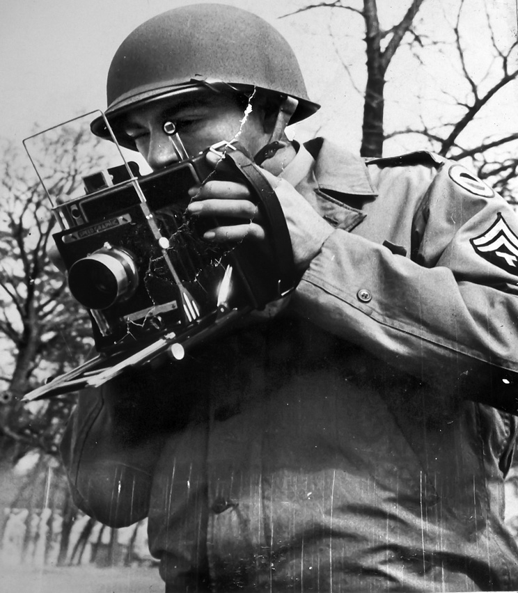 Charles Restifo behind his 4x5 PH-104 camera. Although big and bulky, the PH-104 used large-format sheet film that resulted in crisp, detailed photos. 