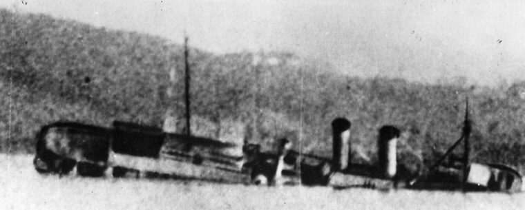 In frames taken from a series of photographs, the USS Panay is sunk–supposedly in error–by Japanese planes in the Yangtze River.