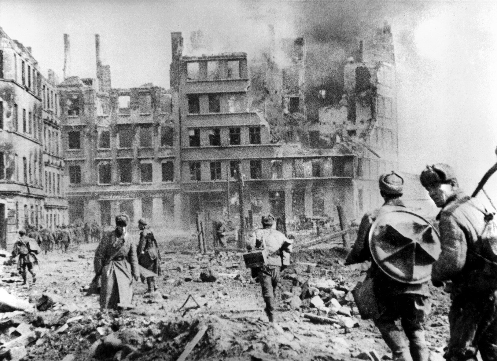 During operations to mop up the last vestiges of German resistance in Königsberg, Soviet troops move forward warily amid the rubble of the city on April 9, 1945. After a two-month siege, an aggressive Soviet effort took Königsberg in four days of intense fighting.