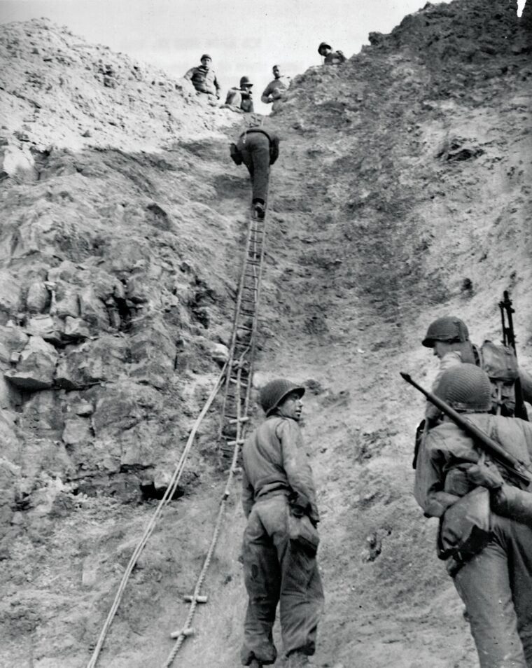 This photo, which vividly depicts one of Pointe du Hoc’s daunting cliffs was, like most photos in this article, taken within a day or two of the battle. Initial resupply for the 2nd Ranger Battalion on top was done like the assault: via ropes and ladders borrowed from London's fire brigades. 
