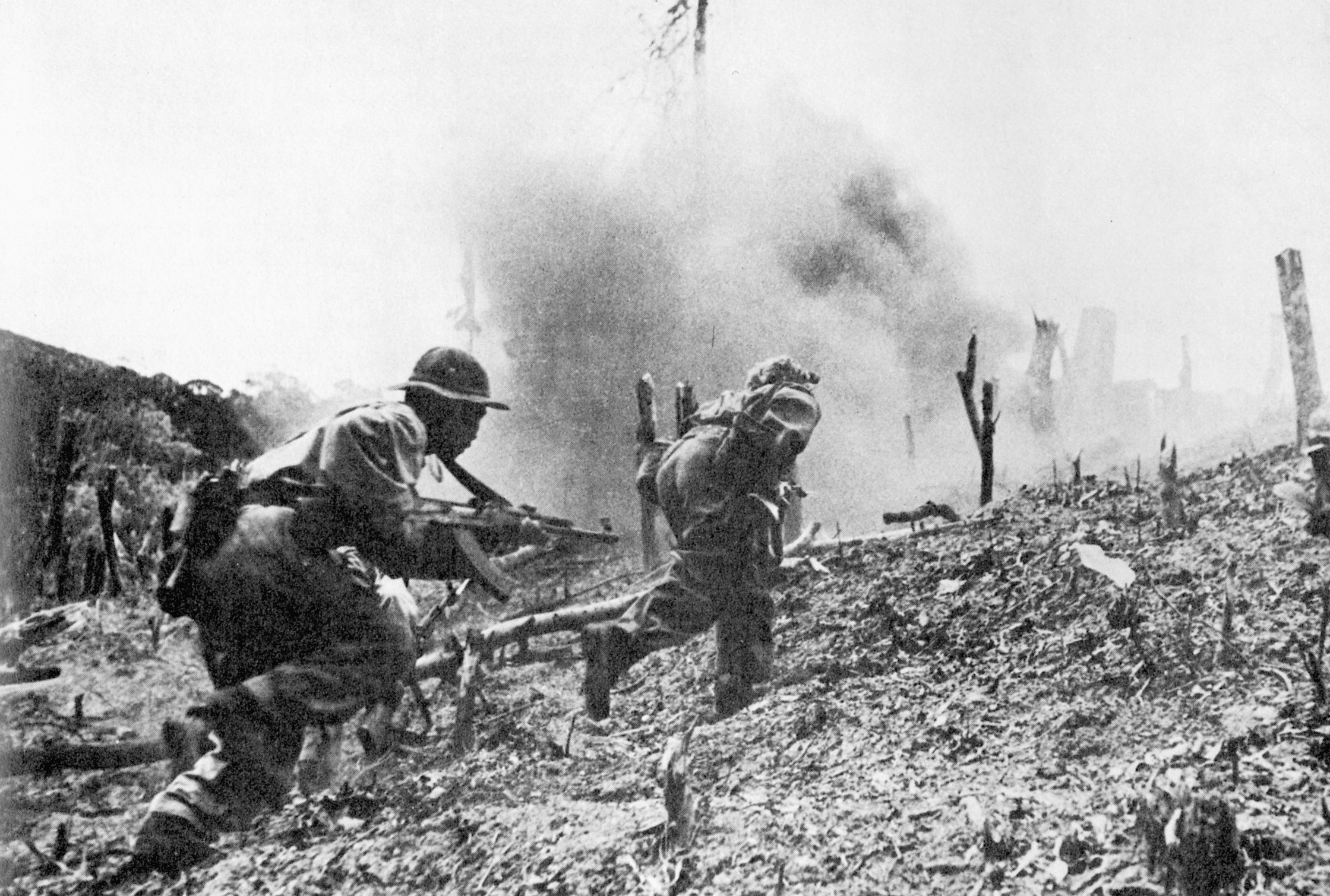 NVA soldiers charge an American position near Khe Sanh. Most NVA attacks were made at night.