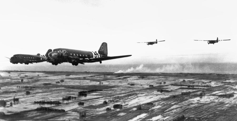 C-47s towing gliders during Operation Overlord.