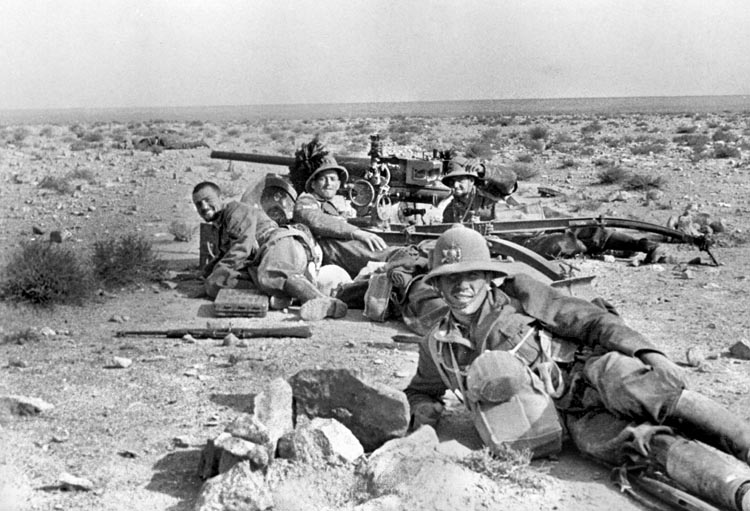 Italian soldiers smile for Rommel's camera in North Africa, circa 1941.