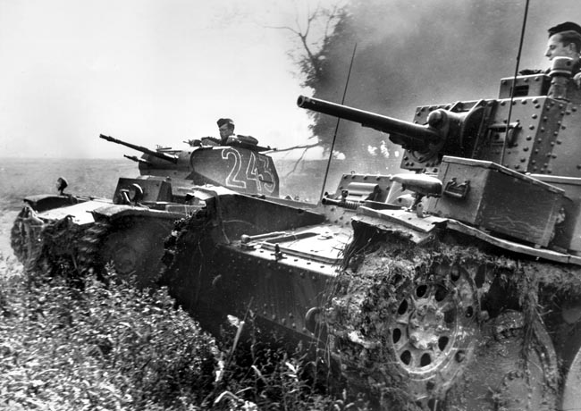 Rommel's panzers loom against a backdrop of dust clouds in France, 1940.