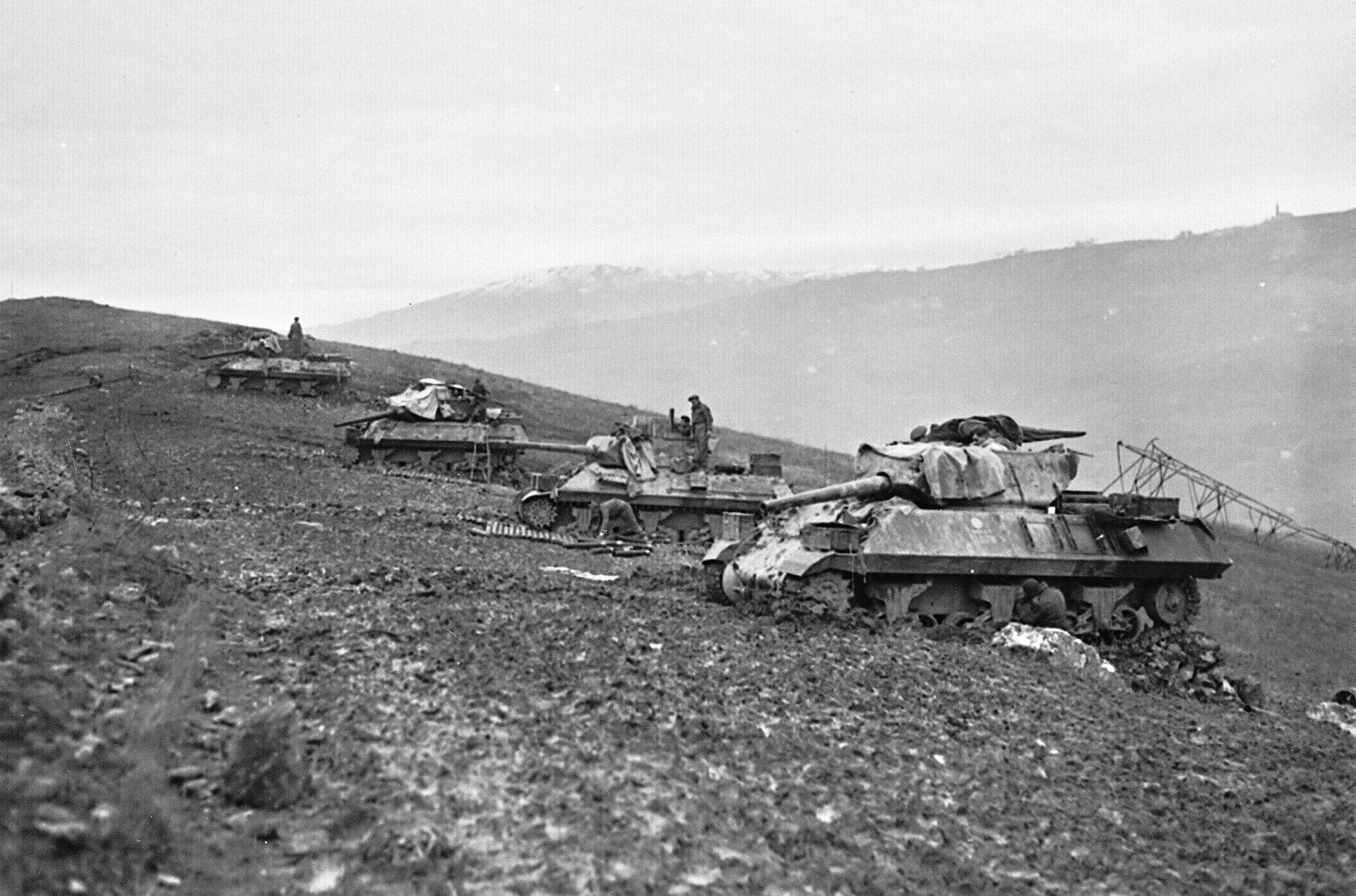 Crews of U.S.-supplied M-10 Tank Destroyers replenish ammunition stocks and perform maintenance in the Gothic Line-Monte Sole area near Bologna, December 1944.