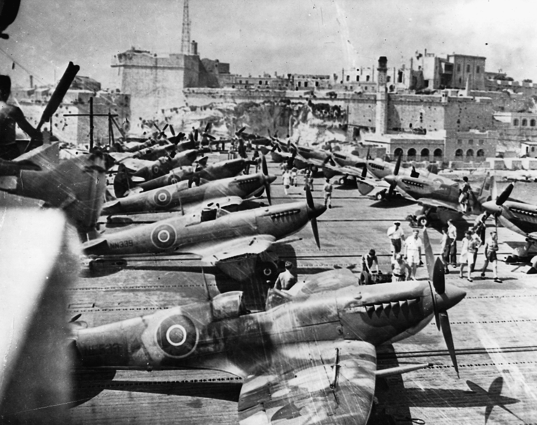 The Wasp’s deck is filled with parked Spitfires as the carrier docks at Malta, May 1942. The Wasp was sunk a few months later in the Pacific by the Japanese. 