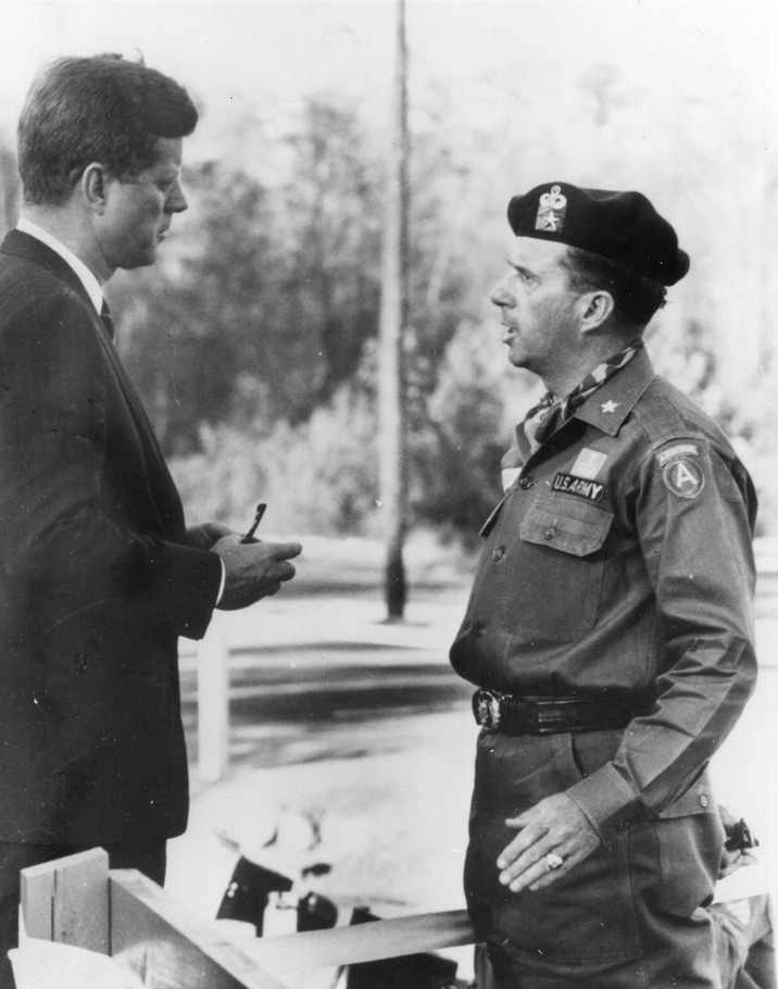 Yarborough talks with President John F. Kennedy in October 1961, the month of the Cuban Missile Crisis. Yarborough is wearing the distinctive green beret that has come to symbolize the U.S. Army’s Special Forces.