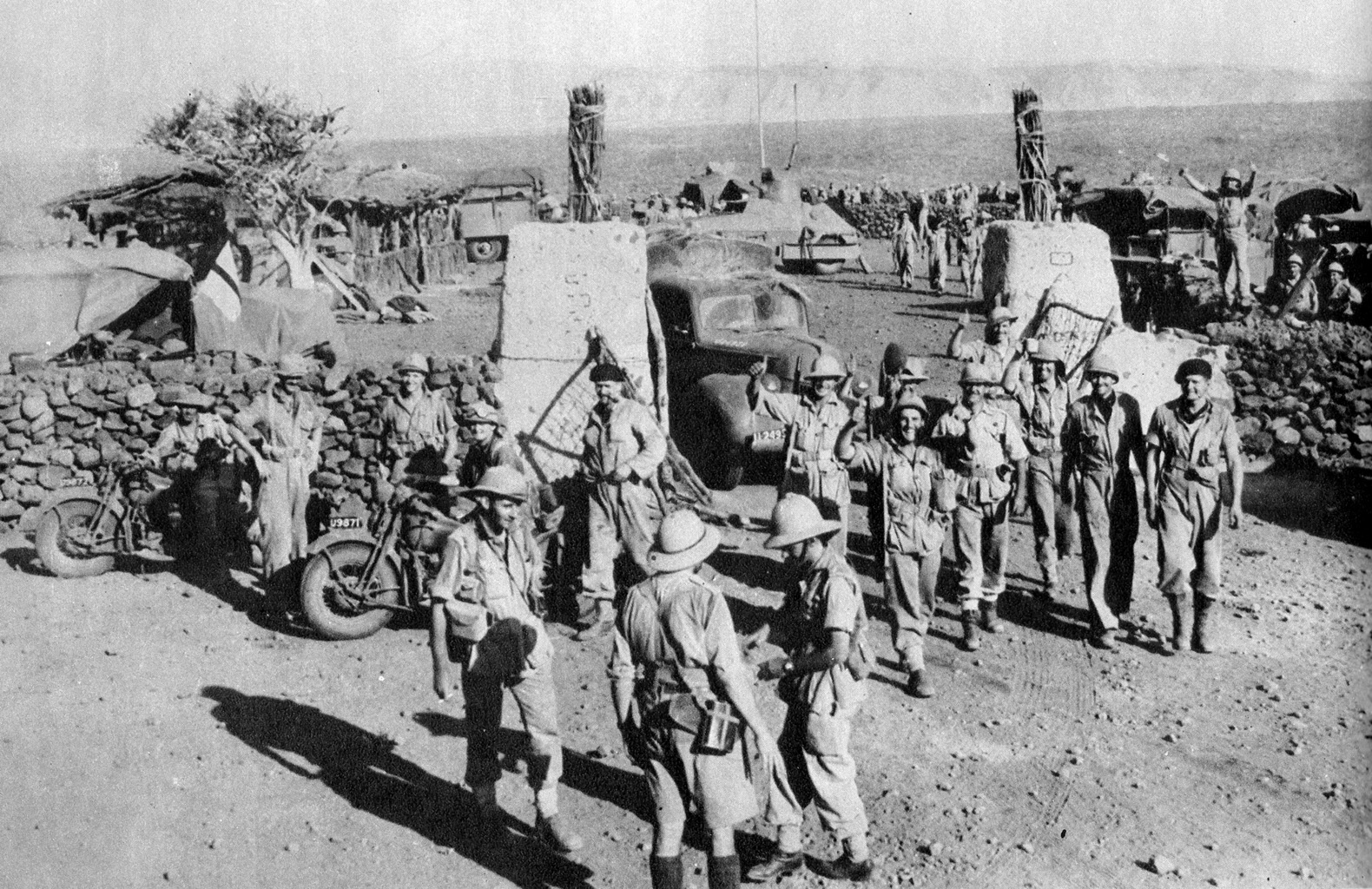 South African soldiers celebrate the capture of Hobok Fort in Abyssinia from Italian forces, February 1941.