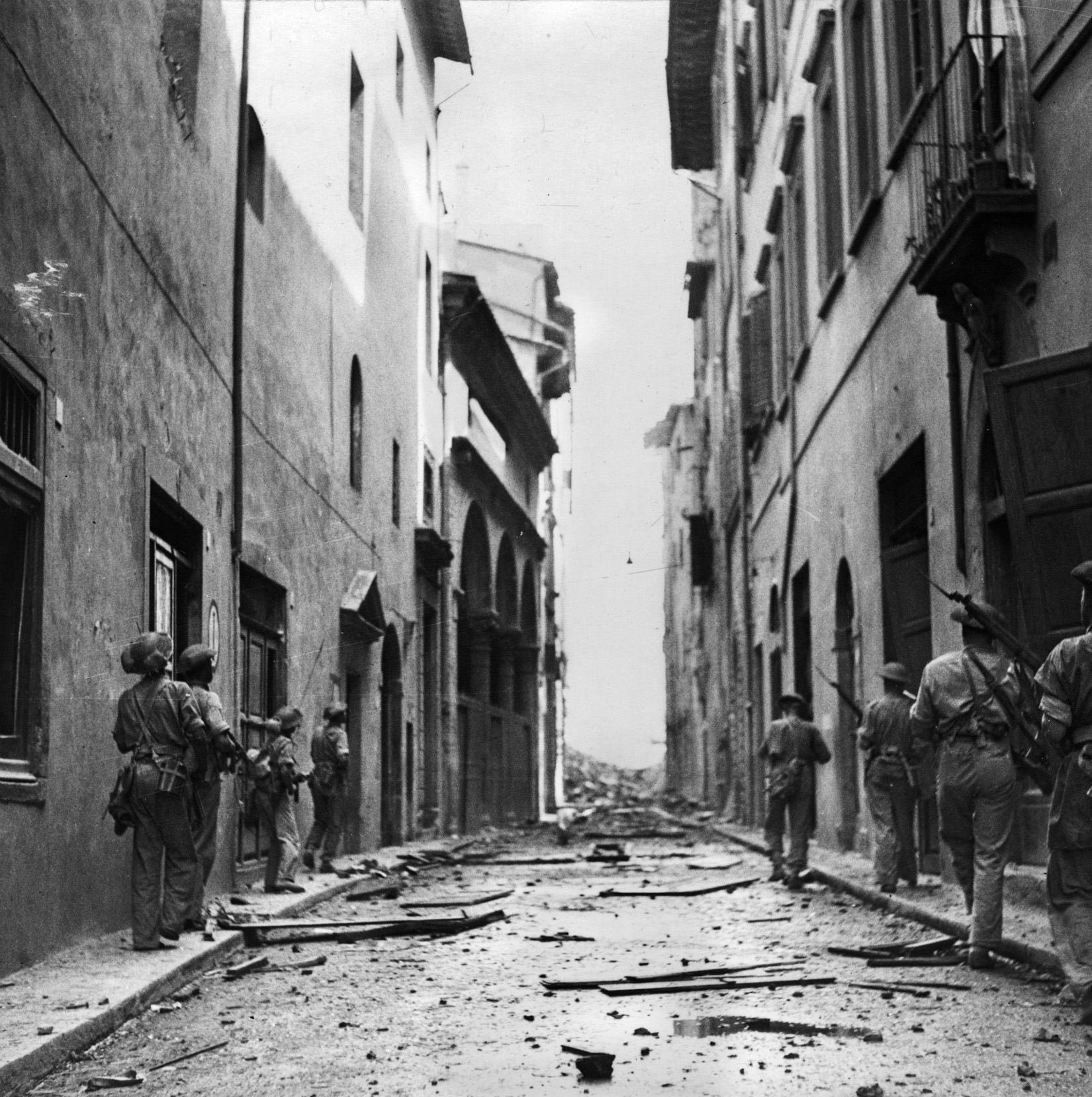 South African soldiers from the 6th Armoured Division, now a part of the U.S. II Corps, patrol the streets of Florence, August 1944.